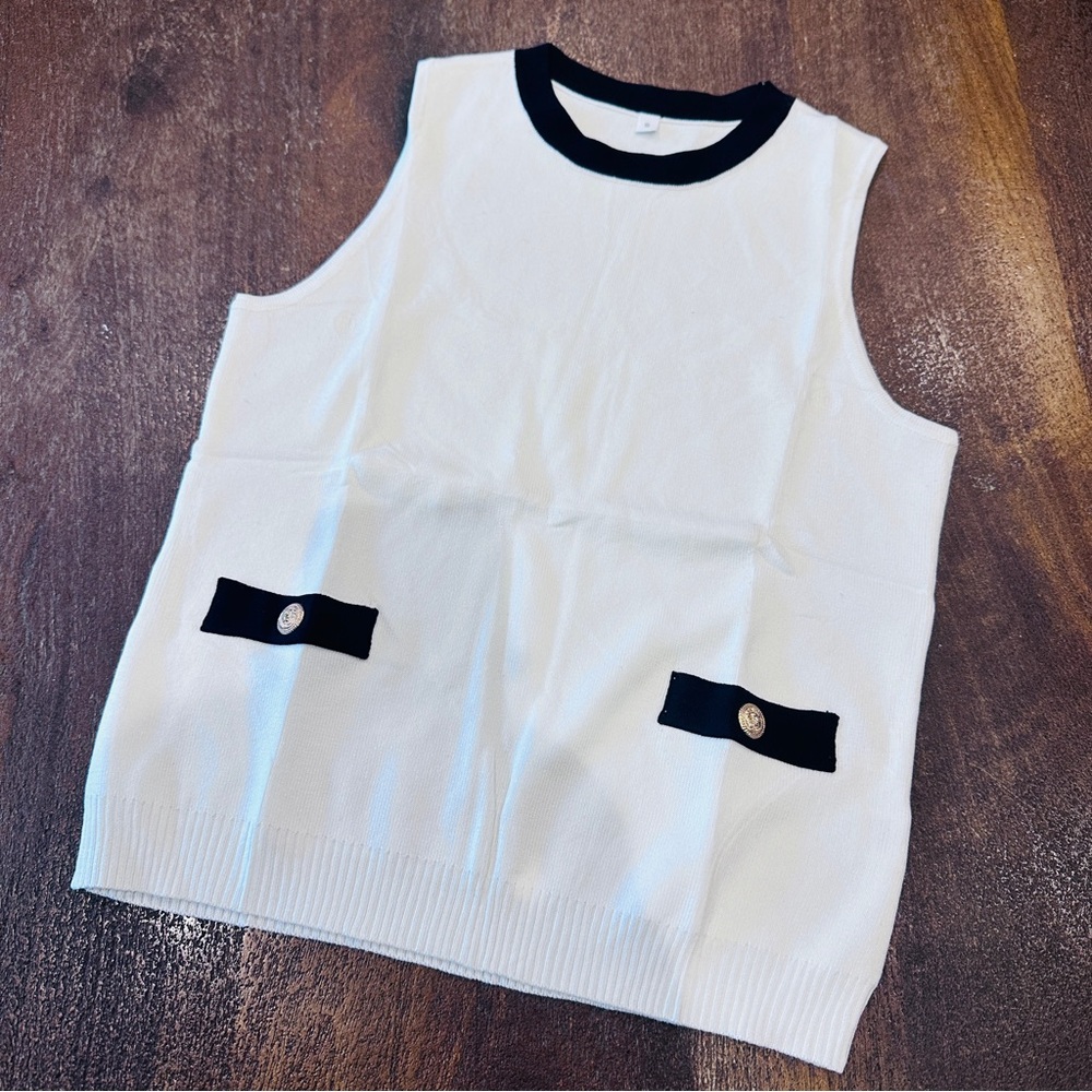 Sleeveless White and Black Top with Button Accents